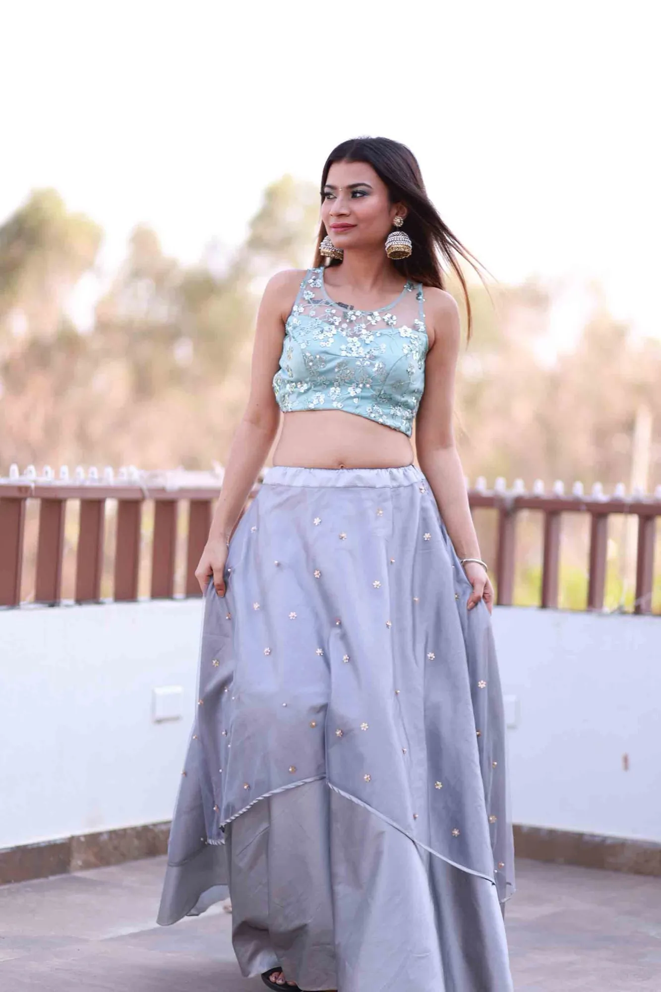 Onion-pink organza lehenga — golden hour